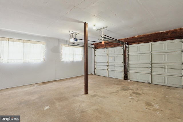 garage featuring a garage door opener