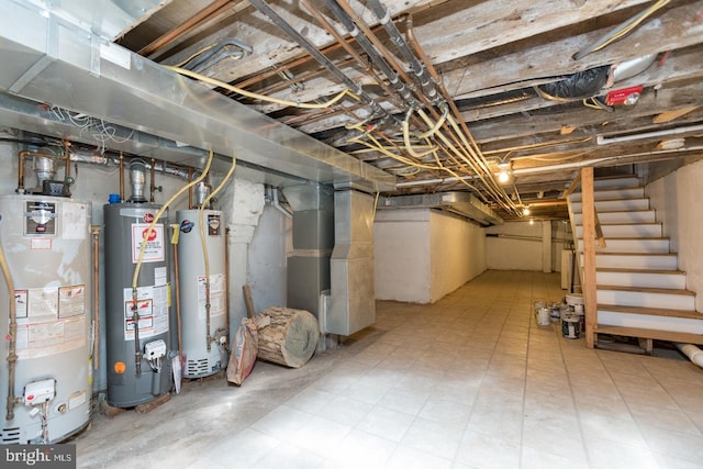 unfinished basement featuring heating unit, stairs, and gas water heater