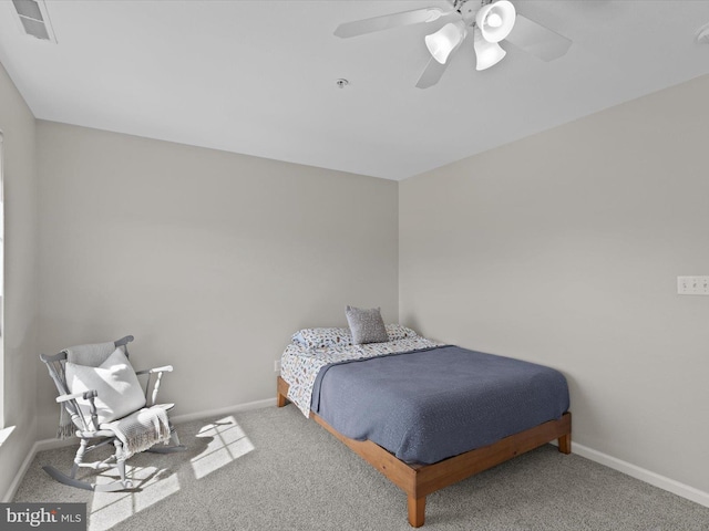 bedroom featuring visible vents, ceiling fan, carpet, and baseboards