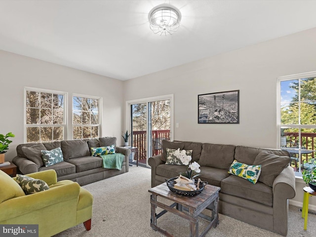 carpeted living room with plenty of natural light