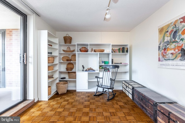 office area featuring a textured ceiling