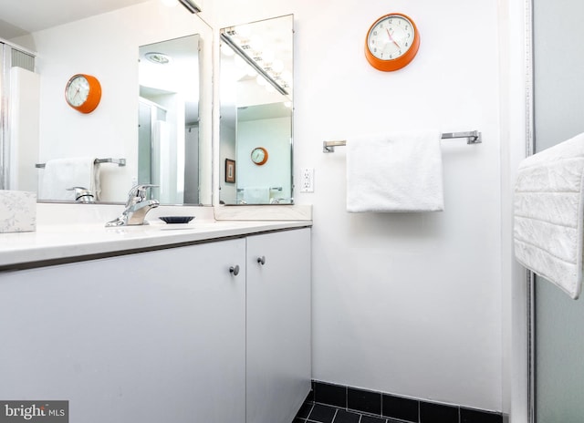 full bath featuring tile patterned floors and vanity