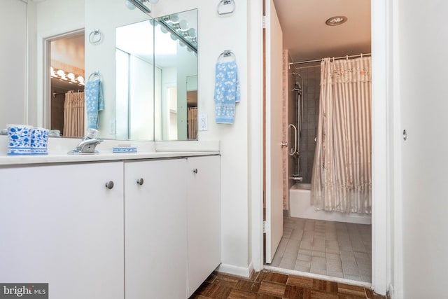 bathroom with vanity and shower / tub combo