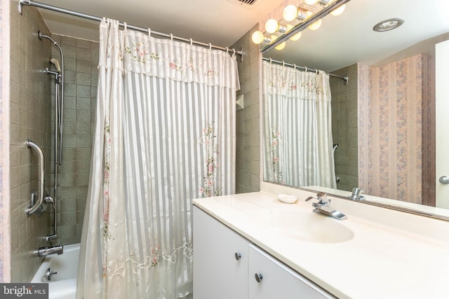 full bathroom with vanity and shower / bathtub combination with curtain