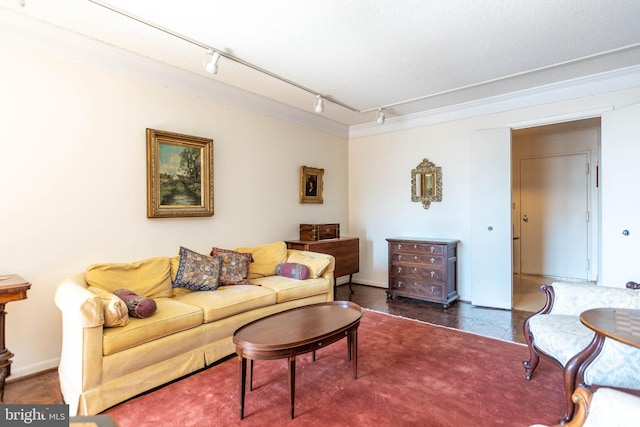 living area featuring a textured ceiling