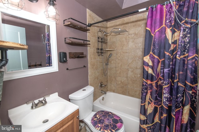 full bath featuring toilet, shower / bath combo with shower curtain, and vanity