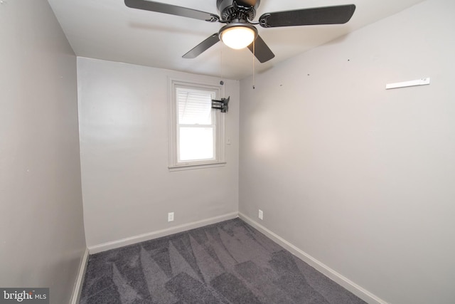 unfurnished room featuring ceiling fan, carpet floors, and baseboards