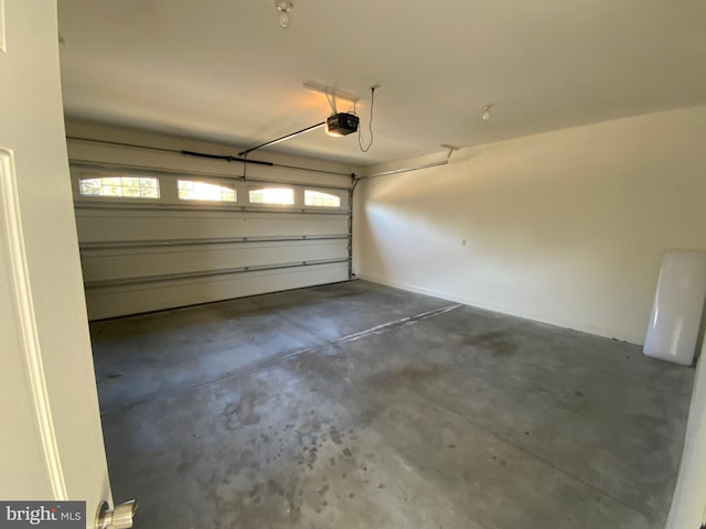 garage featuring a garage door opener