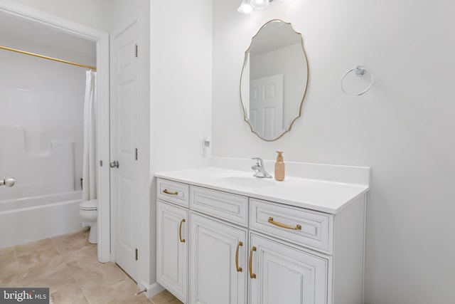 full bath featuring tile patterned flooring, toilet, vanity, and shower / tub combo with curtain