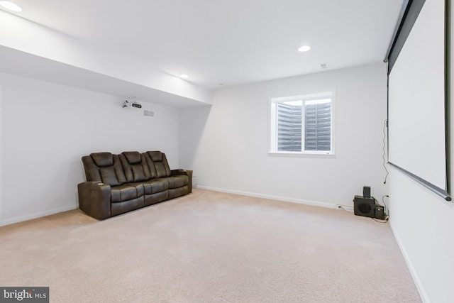 living area featuring visible vents, recessed lighting, baseboards, and carpet