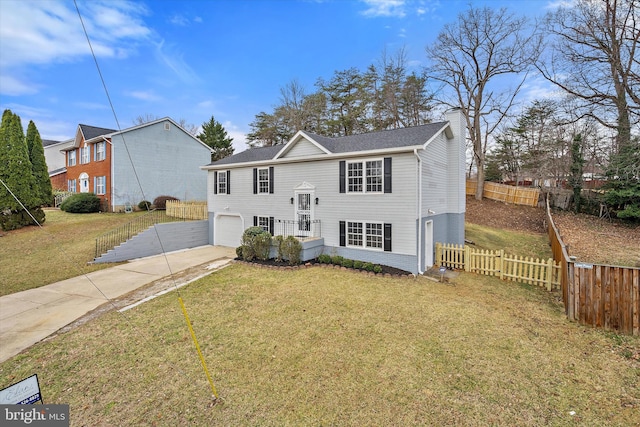 view of front of property with a chimney, concrete driveway, fence, a garage, and a front lawn