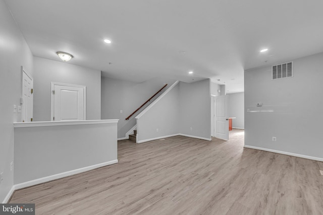 interior space with stairs, recessed lighting, visible vents, and light wood-style floors