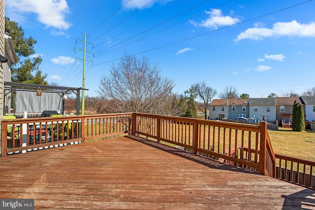 deck featuring a yard