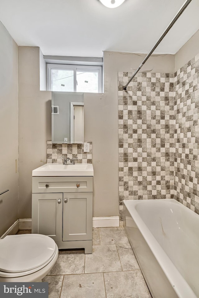 full bath featuring toilet, shower / bath combination, visible vents, vanity, and backsplash