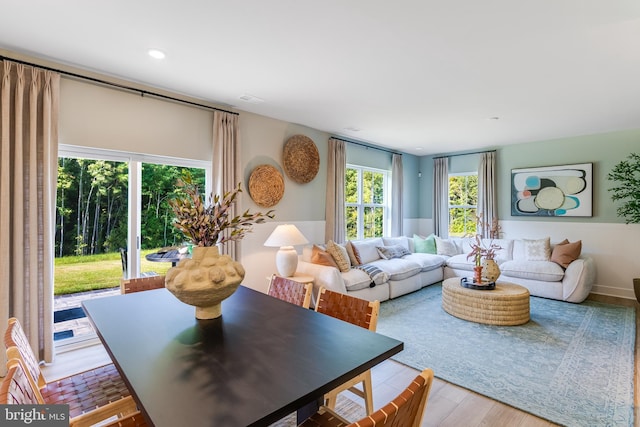 living room with wood finished floors and recessed lighting