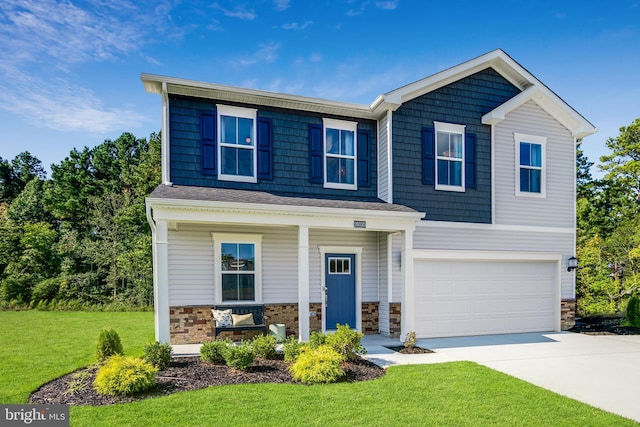 craftsman-style house with a garage, concrete driveway, stone siding, covered porch, and a front yard