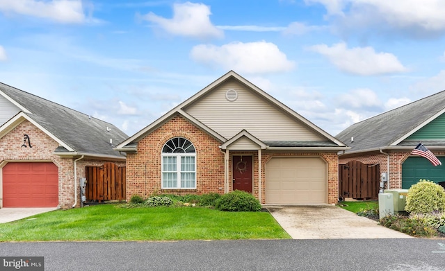 single story home featuring brick siding, fence, driveway, and an attached garage