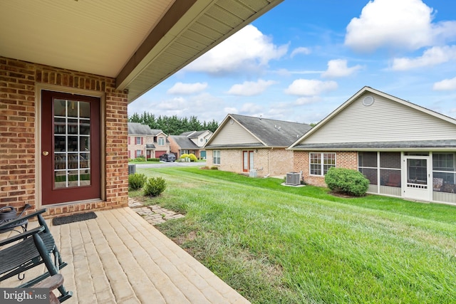 view of yard featuring central AC