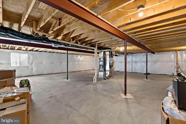 basement featuring heating unit