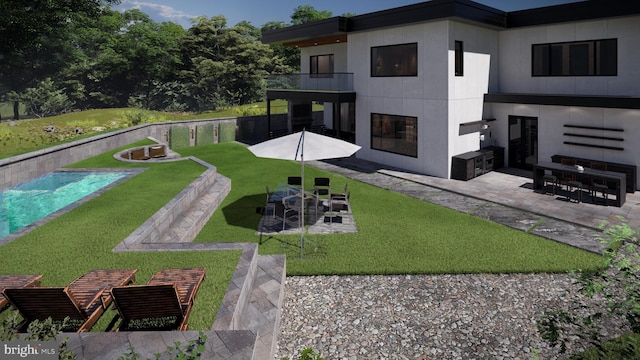 view of yard with a patio area and a balcony