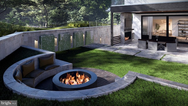 view of yard with a fire pit