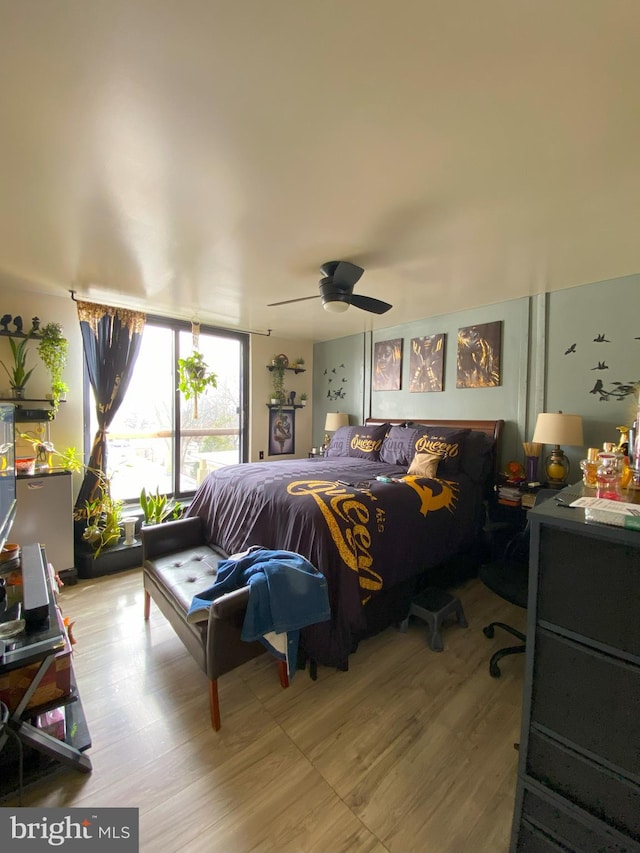 bedroom with wood finished floors