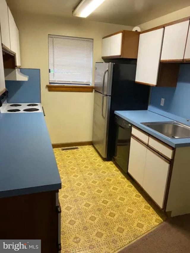 kitchen with baseboards, white cabinetry, dishwasher, and a sink