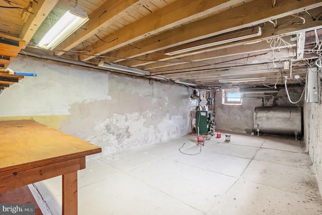 basement with heating fuel and a heating unit