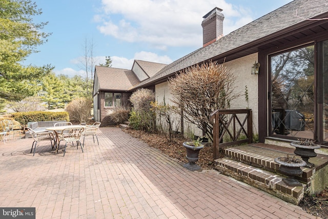 view of patio with outdoor dining area