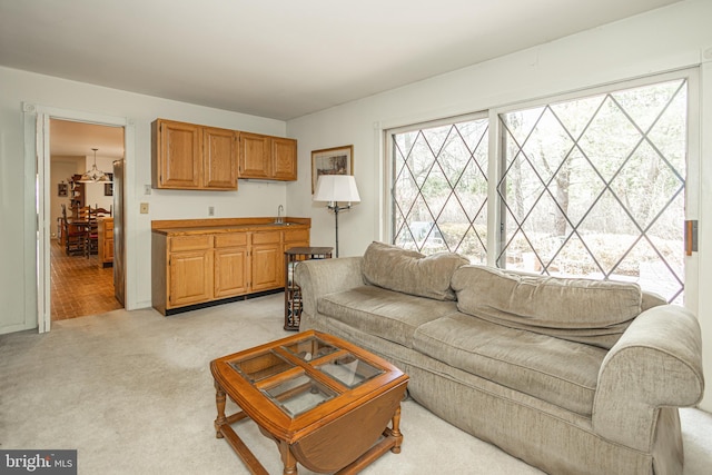 living room with light colored carpet