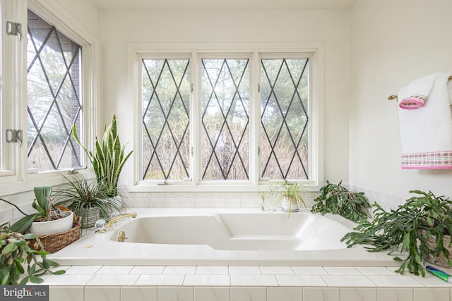 bathroom with a garden tub