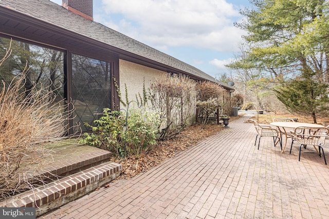 view of patio with outdoor dining space