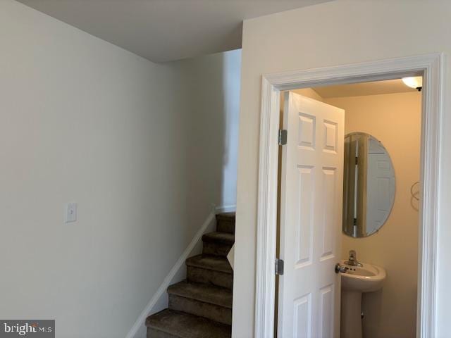 stairway with baseboards