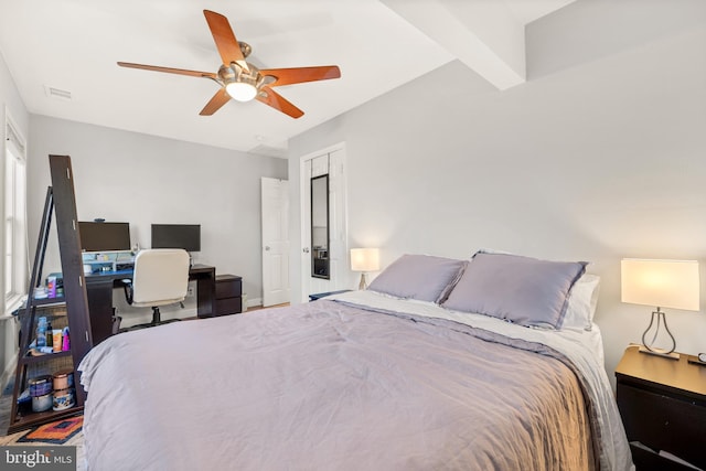 bedroom featuring visible vents and ceiling fan