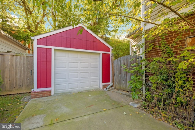 garage featuring fence