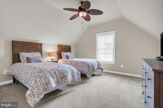 bedroom featuring vaulted ceiling, carpet floors, and baseboards