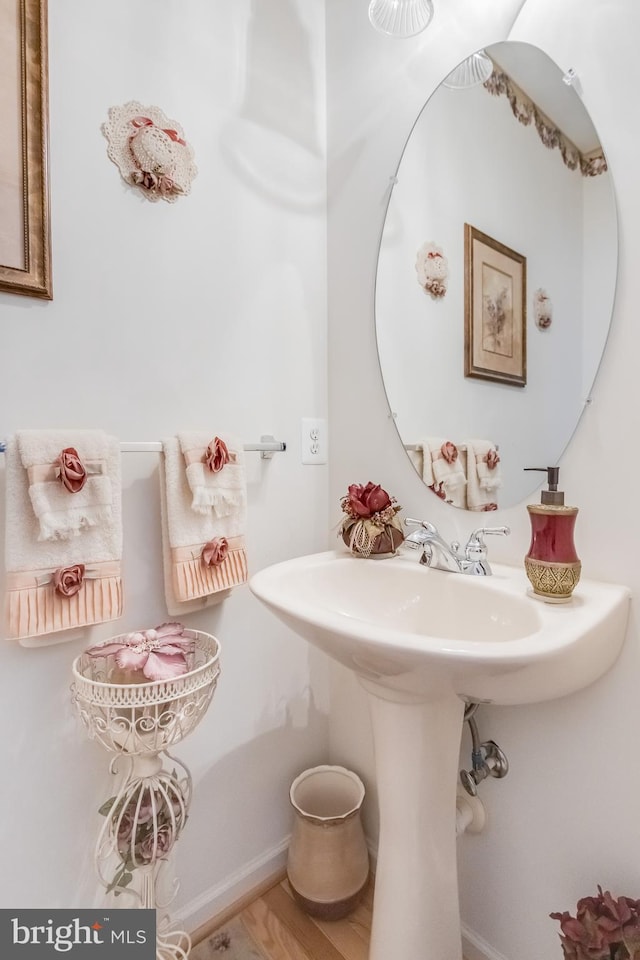 bathroom with wood finished floors