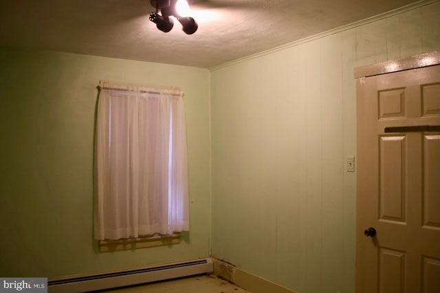 spare room with a baseboard radiator