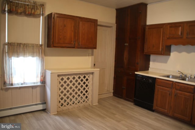 kitchen featuring a sink, light countertops, black dishwasher, a baseboard heating unit, and light wood-type flooring