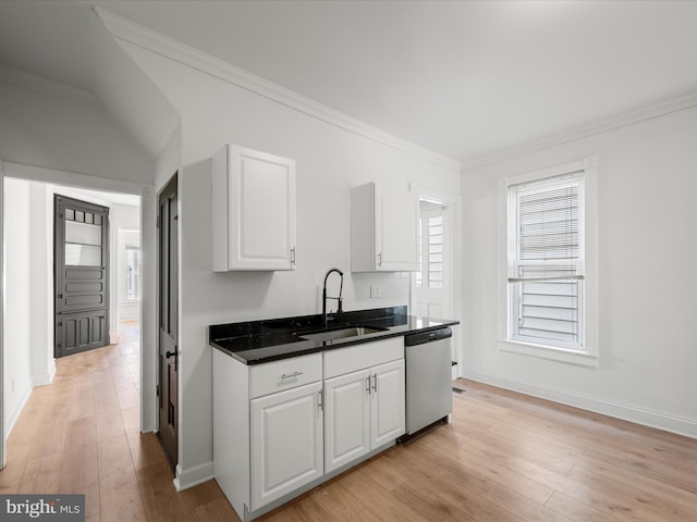 kitchen featuring white cabinetry, light wood-style flooring, a sink, stainless steel dishwasher, and crown molding