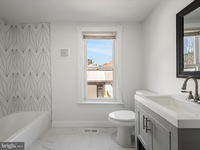 bathroom with visible vents, baseboards, toilet, and marble finish floor