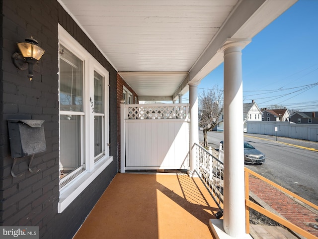 balcony featuring a porch