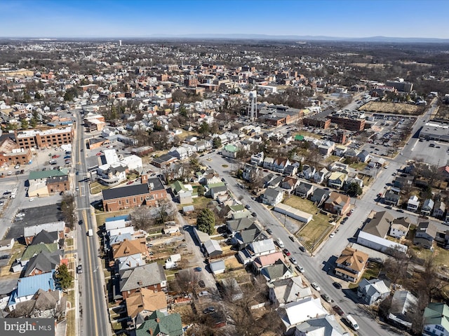 birds eye view of property with a residential view