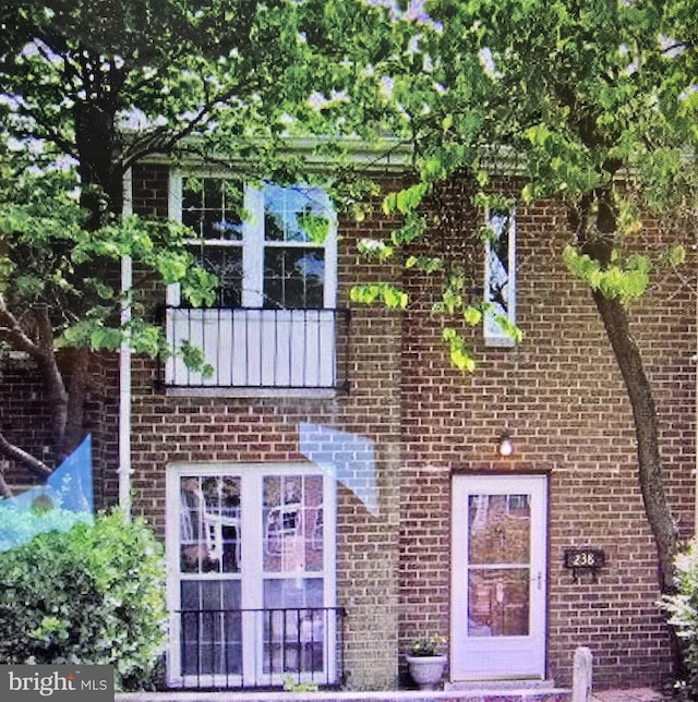 view of front of property with brick siding