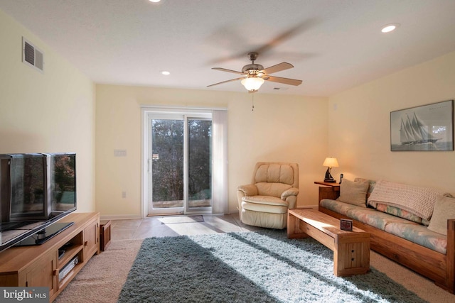 living room featuring light colored carpet, recessed lighting, visible vents, and ceiling fan