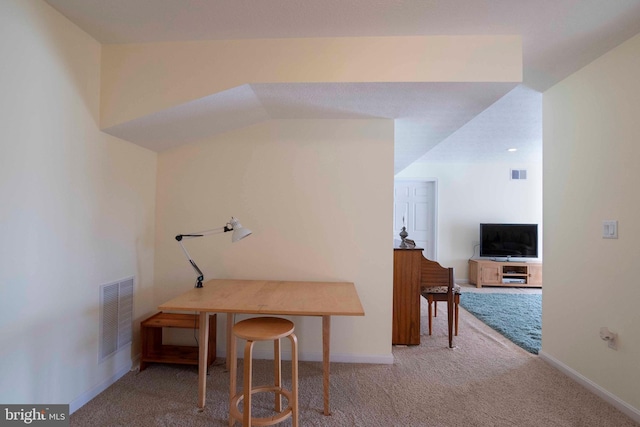 office with carpet, visible vents, and baseboards