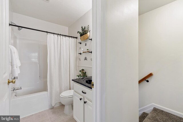 full bath featuring vanity, shower / tub combo, toilet, and tile patterned flooring