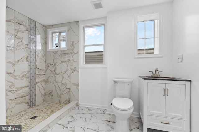 full bathroom with a marble finish shower, baseboards, visible vents, toilet, and marble finish floor