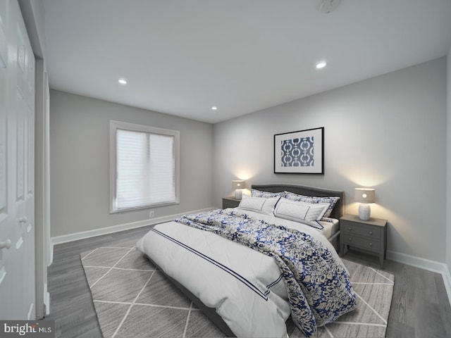 bedroom featuring recessed lighting, baseboards, and wood finished floors