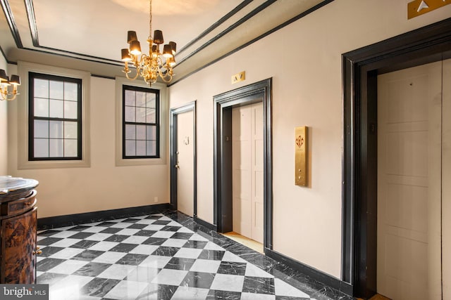 corridor featuring elevator, baseboards, an inviting chandelier, and dark floors